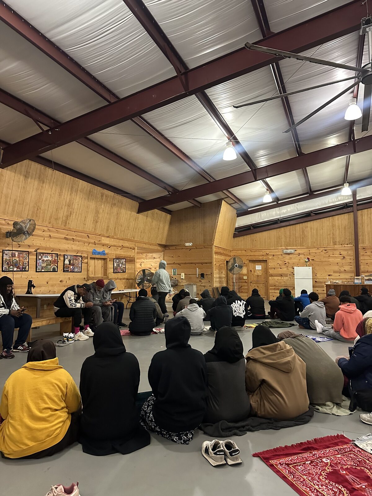 Prayer session in the camp hall