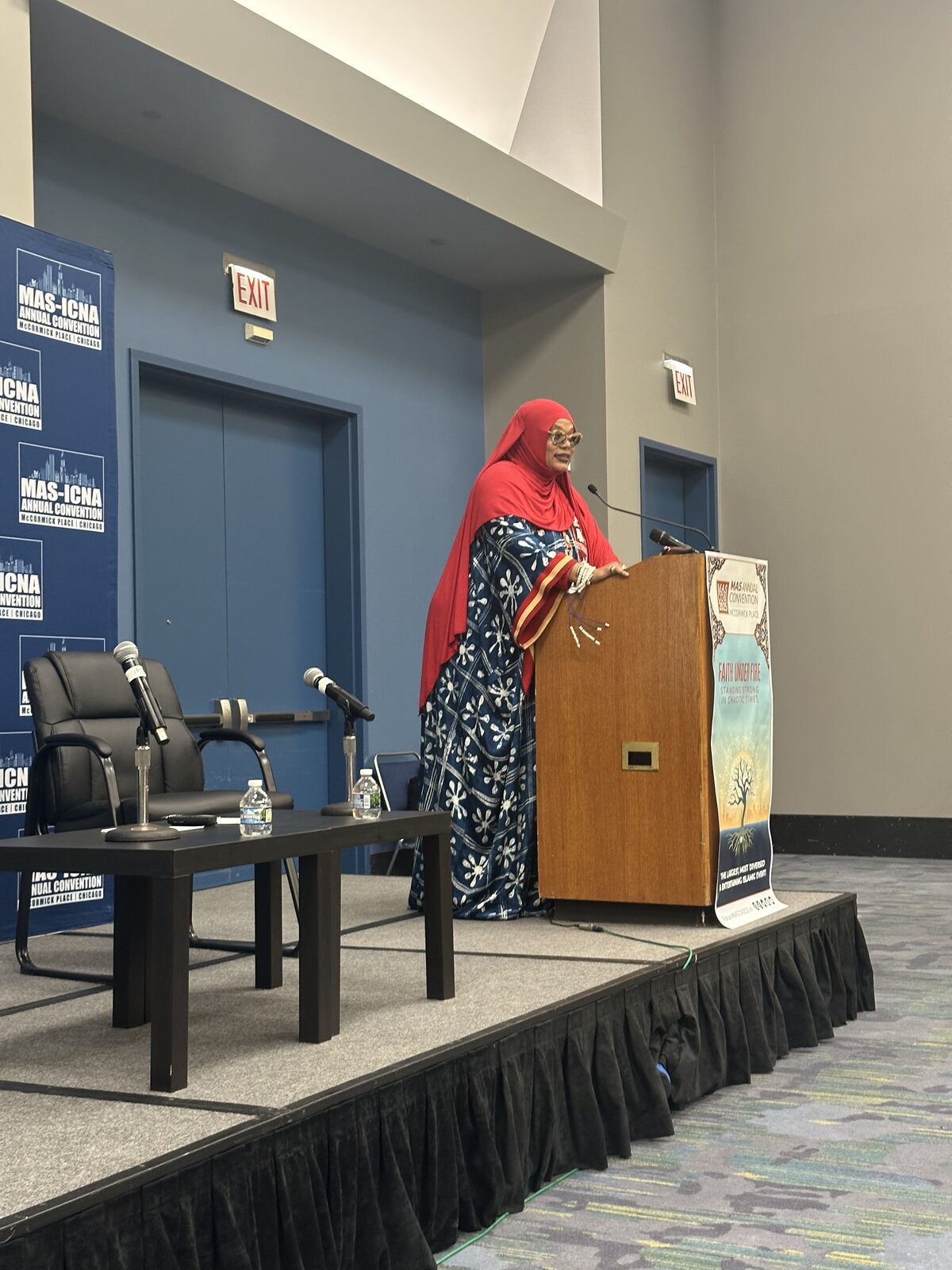 Woman speaking at MAS-ICNA Convention podium