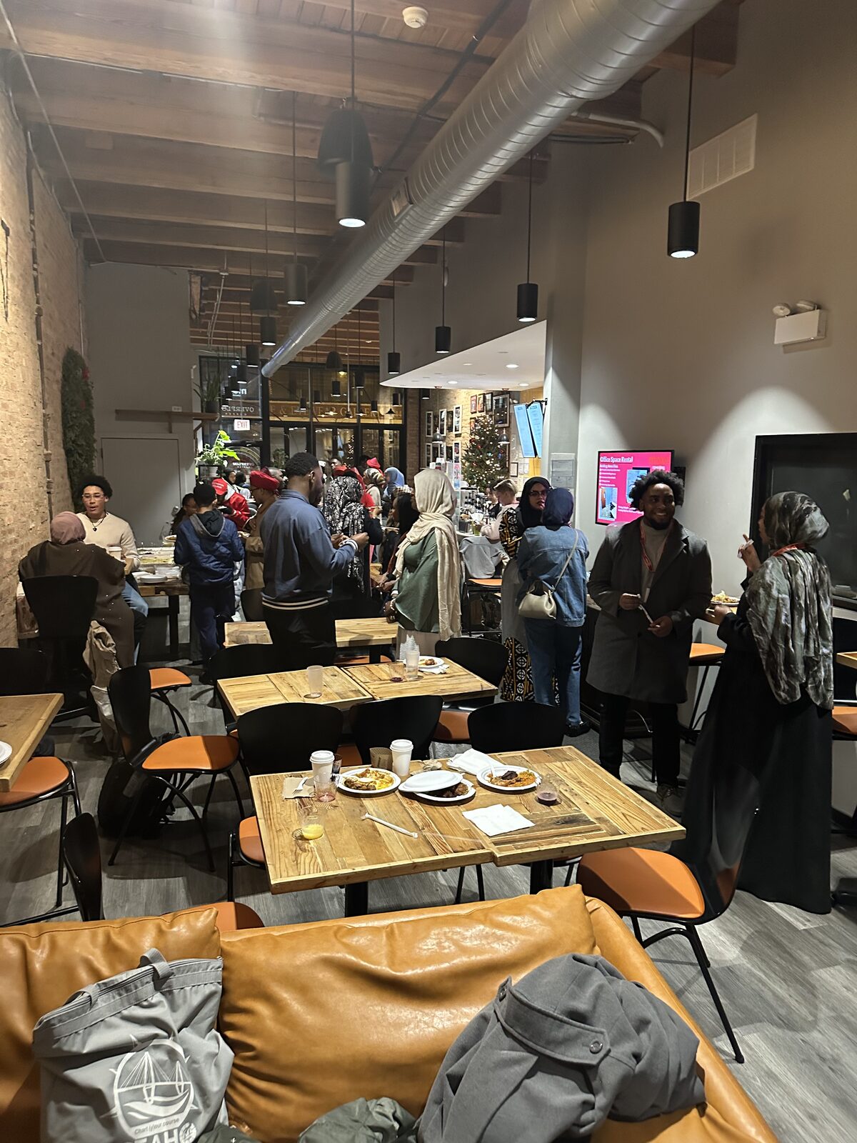 People socializing and eating together